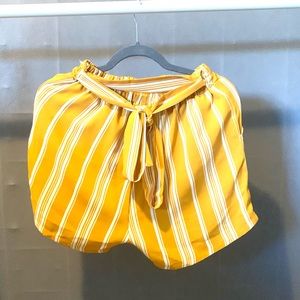 Cute mustard yellow shorts with belt!